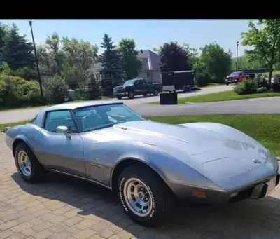 Feast your eyes on this vintage Chevrolet Corvette, a true classic with its iconic design. This beau...