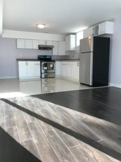 Bright large walkout basement suite with separate entrance, full kitchen, full bathroom, and exclusi...