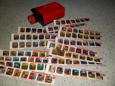 For sale is a Vintage 1960's “Give A Show” projector with 16 color slides. Takes 3 "D" batteries. NO...