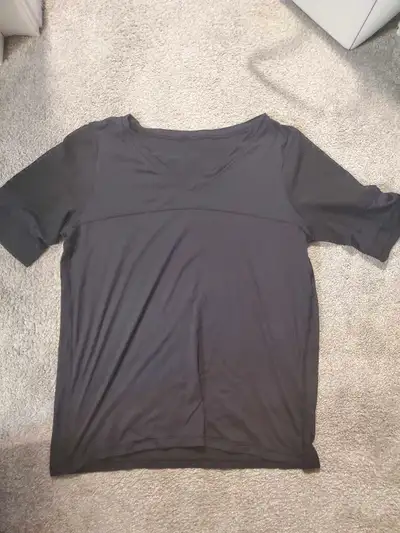 All black men's Lululemon tshirt in excellent condition don't know the size but is 20.5" across flat...