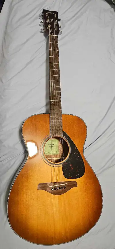 Selling Yamaha FS800 guitar with bag and some useful accessories, View more
