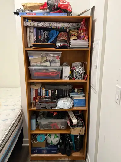 Classic brown solid wood bookshelf with 5 shelves up for grabs, View more