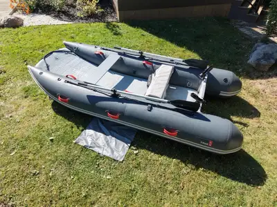 Selling my True Kit Discovery 3.3m inflatable catamaran in Gunmetal Grey, together with a Tohatsu MF...