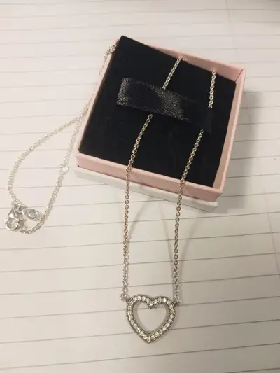 Selling a beautiful Pandora necklace with open heart pendant- 18" Worn once. Box included. $60