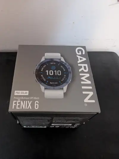 Fenix 6 Pro Solar Multisport GPS watch, Mineral Blue with White Band. Brand new sealed in box, $490