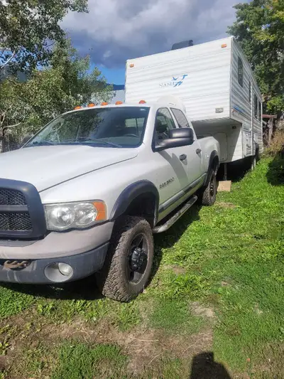 05 Dodge Ram 3500 4x4 auto short box 5.9l diesel come with a 95 Nash 27.5ft Fifthwheel with slide an...
