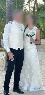 Size small (size 2/4), ivory with matching men’s vest and tie.