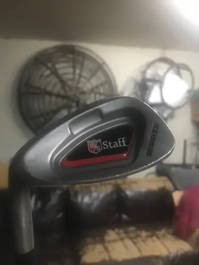 set of Wilson Iron golf clubs, View more