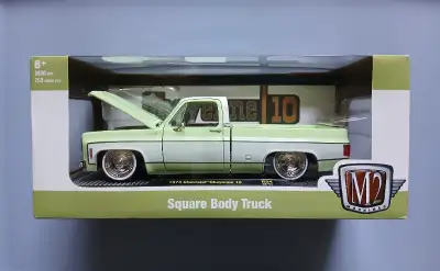 1973 Chevrolet Cheyenne 10 M2 Machines 1:24 Scale Chevy Square Body Truck Package is mint Sealed, ne...