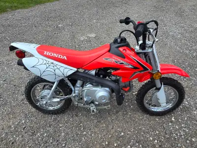 50cc Dirt bike. Great condition. Spiderman edition. Lol. We have two and we needed to tell them apar...