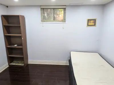 Room for rent in a legal basement (female or couple)