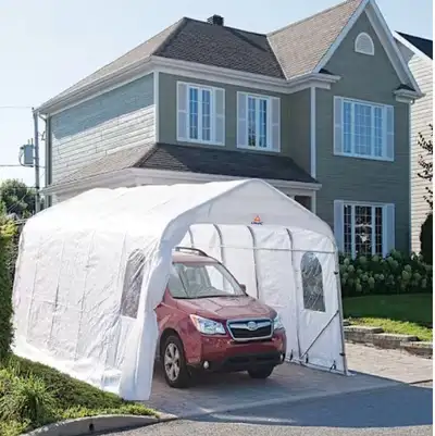 Garage de toile 12 x 20 utilisé 1 hiver Abri d'auto pour l'hiver. Solide structure de tuyaux ovales...