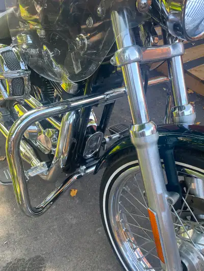 The model is a 1200 Custom with spoked front wheel and a solid in rear. Senior owned since 2008 and...