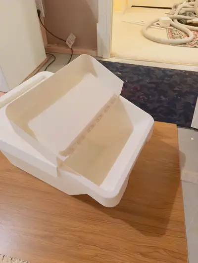 Two used, heavy-duty storage bin with a hinged lid, perfect for pet dry food storage , The bin is in...