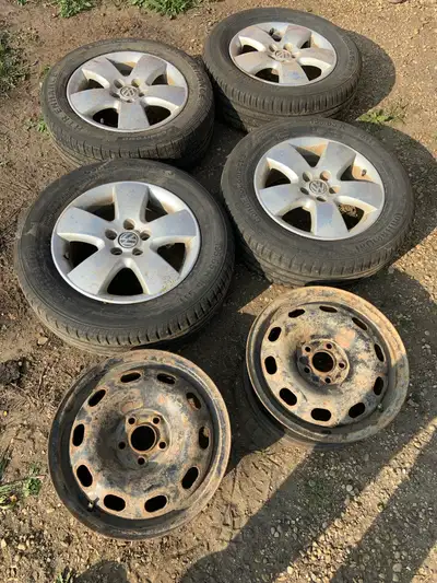 Have a set of Jetta rims and tires. Rims are in decent shape. Some rock chips. 5x100 bolt pattern. W...