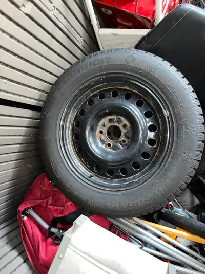 225/65r17 winter tires on rim, only used for one winter season. Used on a 2016 rogue. $700 or best o...