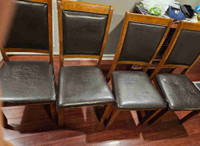 Selling 4 solid construction mahogany brown faux leather chairs