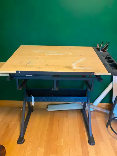 Adjustable drafting or art table, View more