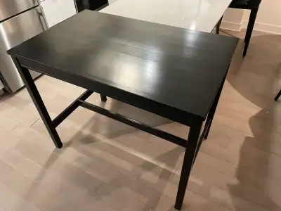 Black stained pine bar table from Ikea. Measurements: Table length: 118 cm (46 1/2 ") Table width: 7...