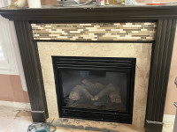 Gas fireplace with custom wood mantle