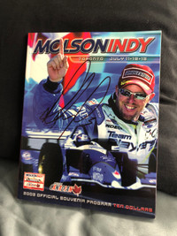 2003 Molson Indy official program SIGNED by Paul Tracy. Cool!