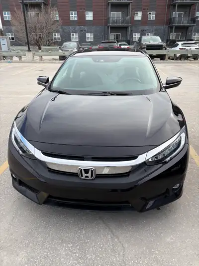 2016 Honda Civic touring model Kilometres - 151000 Highest Trim model Turbo Engine Fresh Safety! Fea...
