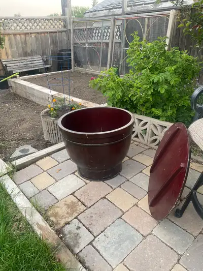 25” wide x 201/2” high , lid , 2 metal bands …..planter , deck table , storage, coffee table ??