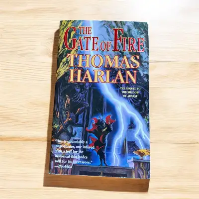 Excellent preowned condition soft cover book. The Gate of Fire is the second novel in the Oath of Em...