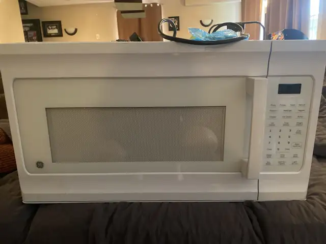 GE  Over range White Microwave in Microwaves & Cookers in Oshawa / Durham Region - Image 2