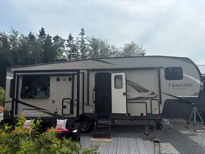 2019 Flagstaff Super lite 1/2 ton towable couples camper. Used very little. Has 3 slides, fireplace,...
