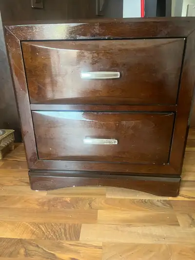 This is a Najarian nightstand, perfect for adding a touch of elegance to any bedroom. It features tw...