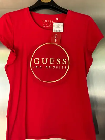 Get ready to turn heads with this brand-new Guess Los Angeles T-shirt in a vibrant cherry red, size...