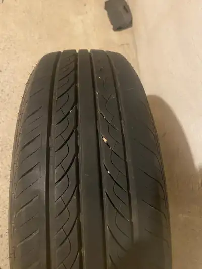 4 good tires with plenty of tread. One is on a steel rim. 20$ each 80$ for all.