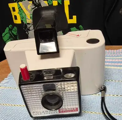 Polaroid Swinger Camera, View more