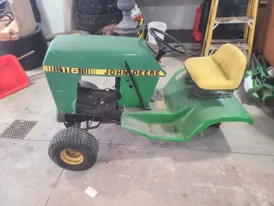 Got a JD 116 lawn tractor. Has no rear transmission. Got tge rear wheels yet. Engine is off (Don't n...
