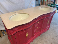 Refinished double sink vanity with marble top.