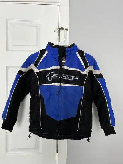 FXR Winter Youth Jacket Size 8 Good condition - has been really worn. There is a rip on the sleeve s...