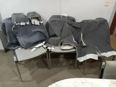 USED PARTIAL SET OF SEAT COVERS. 7 PIECES; INCLUDES: -2 FRONT HEADREST COVERS -2 FRONT SEAT BUCKETSE...