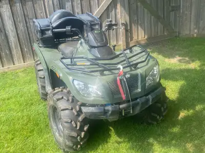 2014 Arctic cat 400 ATV in great shape 830 km comes with snow plow two up seat. Aftermarket rims and...