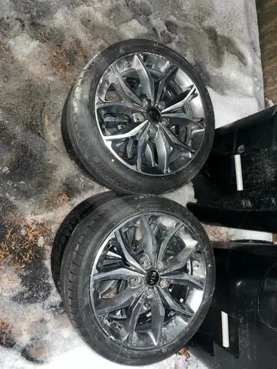 Two brand new tires on rims, two driven maybe a month at most. Aluminum rims are in good shape. Aski...