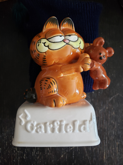 Made in 1981 by Enesco. The ceramic has no damage. The music box may require a bit of work to get ru...