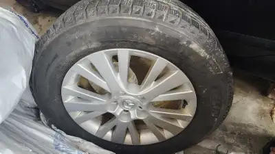 Set of 4 tires 225 65 r17 on mazda rims.