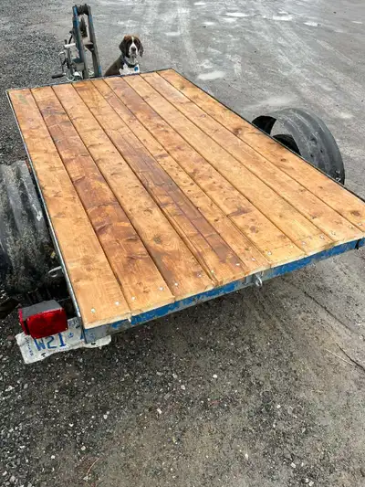 For sale; 4-1/2 ft wide, 7ft long utility trailer. All new wood, lights, wiring, new jack, good tire...