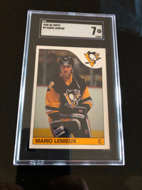 Vintage 1985 Mario Lemieux rookie card graded SGC near mint 7