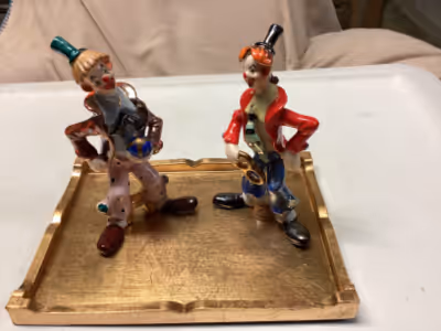 These vintage clown figures are a delightful addition to any collection. With their charming and col...