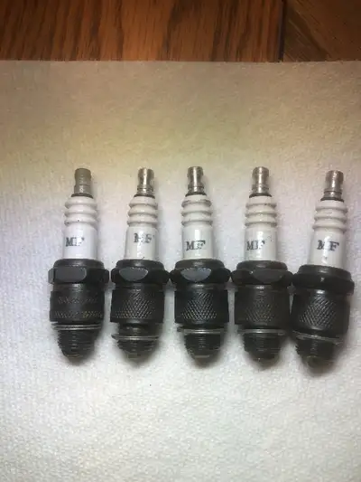5 new old stock MF 226 spark plugs