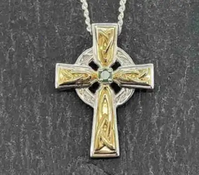This new Celtic pendant cross comes with a chain, blending traditional design with a modern touch. T...