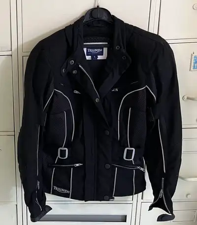 Triumph Motorcycle Jacket, Ladies size small and Rain Jacket, View more