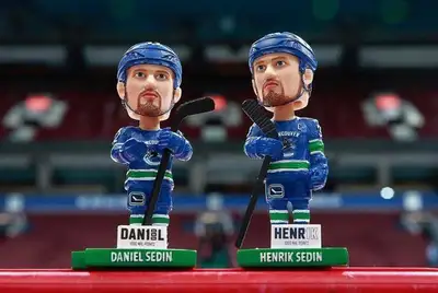 Sedin Jersey retirement night arena edition T-shirt (for fan in attendance only) Henrik Sedin $50 (M...