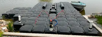 Jet Dock floating modular drive on/off boat dock. Able to drive boat on and off. Keeps boat out of w...